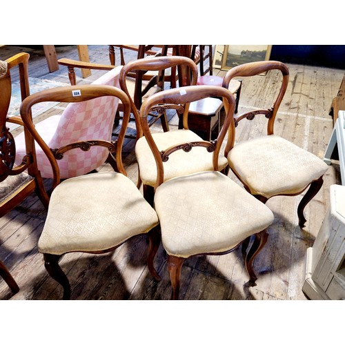 224 - Four mahogany framed early 20th century bar splat back dining chairs with scrolling cabriole legs