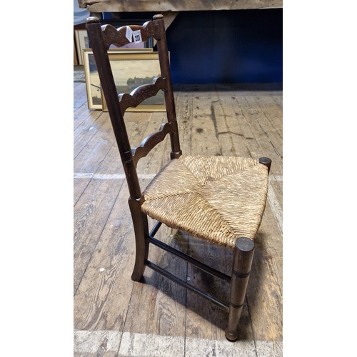 227 - Childs ladder back rush seated chair