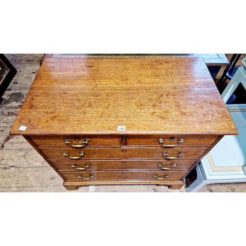 228 - Georgian oak straight front chest of 2 over 3 graduating drawers with brass drop handles on bracket ... 