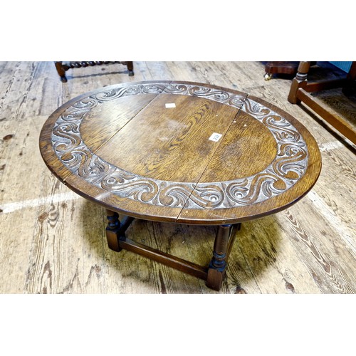 238 - Mid century oak drop leaf occasional table with carved border on turned legs