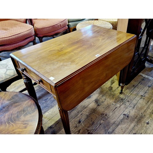 245 - Victorian mahogany Pembroke table with single drawer and corresponding dummy on turned and fluted le... 