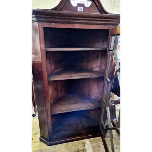 246 - 20th century mahogany wall hanging corner cupboard with astral grazed door and swan neck pediment