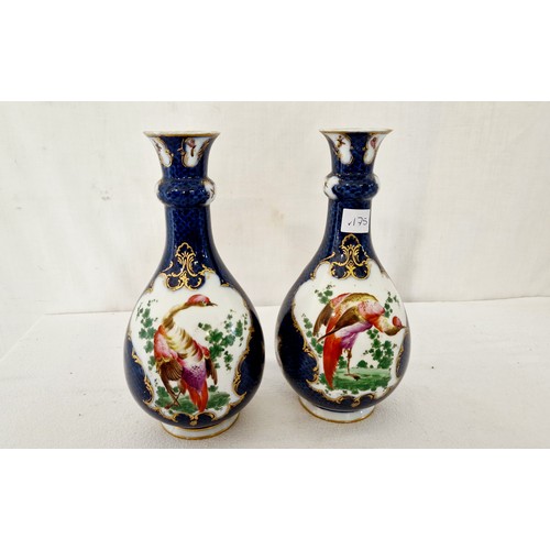 33 - Doulton Lambeth bottle vase and pair of ornate blue gilt bottle vases with hand painted peacocks and... 