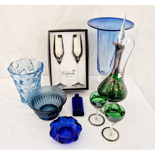 74 - Various decorative coloured glassware incl. a pair of boxed Dartington champagne flutes