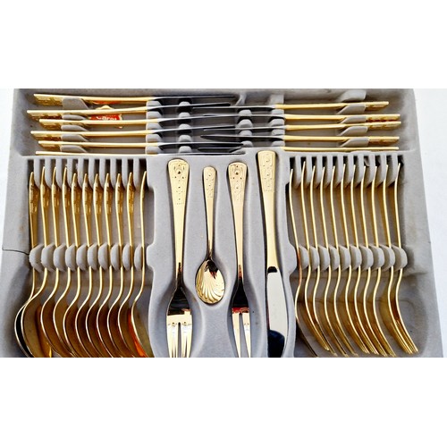 95 - Canteen of Rostfrei gold plated cutlery and six service mother of pearl fish cutlery