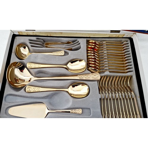 95 - Canteen of Rostfrei gold plated cutlery and six service mother of pearl fish cutlery