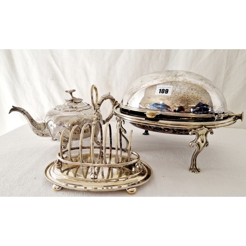 109 - EPNS tableware comprising Victorian dome lidded muffin dish, 6 slot toast rack and embossed teapot