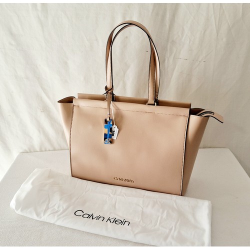 110 - Calvin Klein ladies tote bag, blush pink as new with cloth dust bag