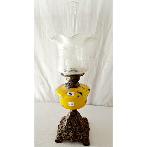 114 - Duplex Linden oil lamp with mottled yellow glass reservoir with pierced metal base