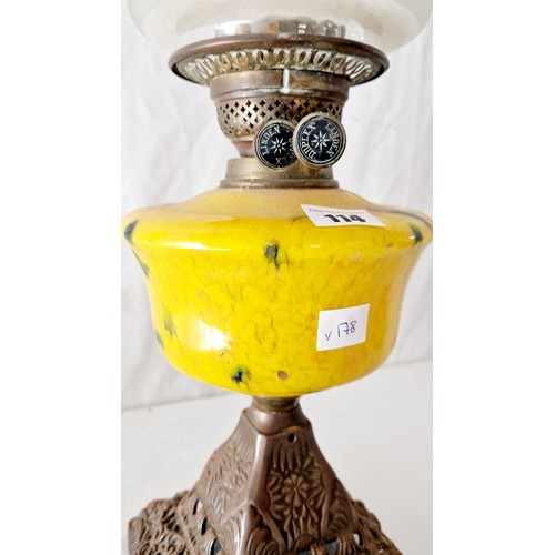 114 - Duplex Linden oil lamp with mottled yellow glass reservoir with pierced metal base