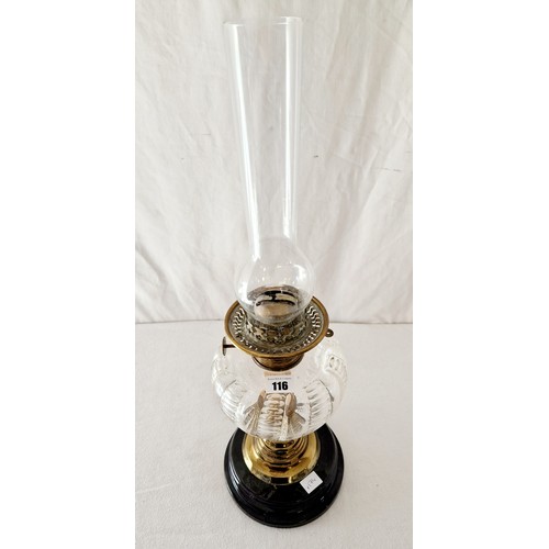 116 - Edwardian oil lamp with clear glass reservoir with brass support to glass plinth