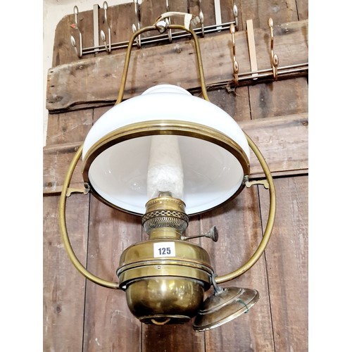 125 - Brass hanging oil lamp with glass shade and chimney