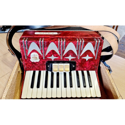 126 - Cased Firotti piano accordion