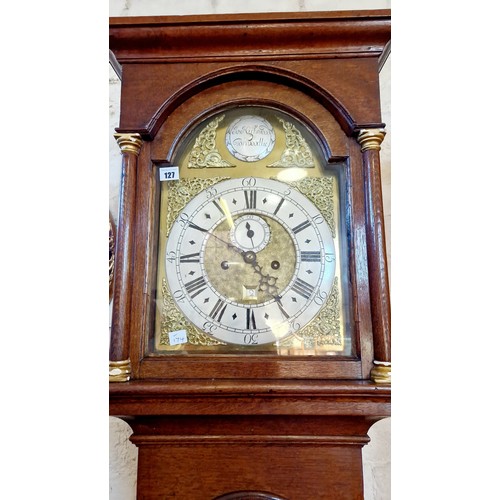 127 - Oak long case clock with brass face and eight-day movement by Jo Kirkwood