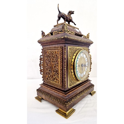 128 - Bracket clock by JW Benson of London 8692 with ormolu mounts, surmounted by a dog approx. 48cm tall,... 