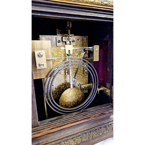 128 - Bracket clock by JW Benson of London 8692 with ormolu mounts, surmounted by a dog approx. 48cm tall,... 