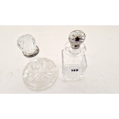 149 - Two small glass decanters, a ship’s decanter with Sheffield 1991 silver collar with swag decoration,... 