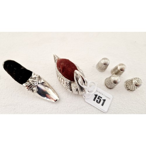 151 - Two Birmingham silver pin cushions with velvet inserts, 1904 in the form of a ladies shoe; 1946 in t... 