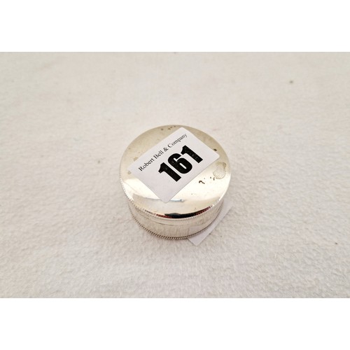 161 - A Sheffield 1917 silver cylindrical pill box with engine turned rim and base c. 0.8 ozs