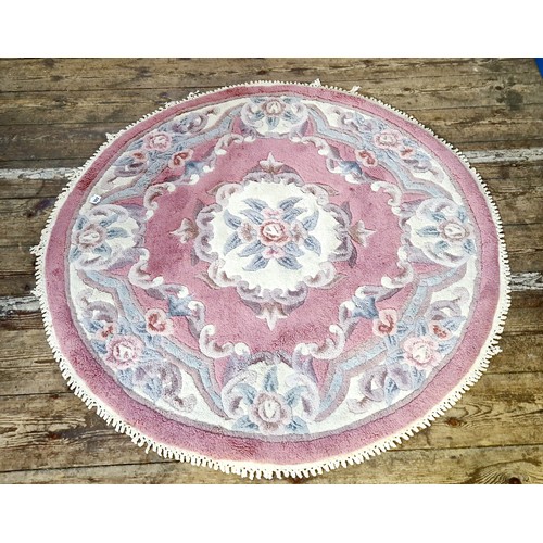 202 - Circular pink floral rug approx. 127cm diameter