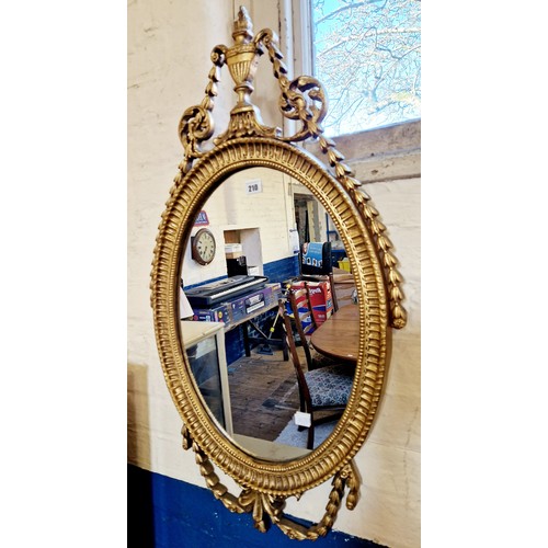 210 - Reproduction gilt effect oval wall mirror