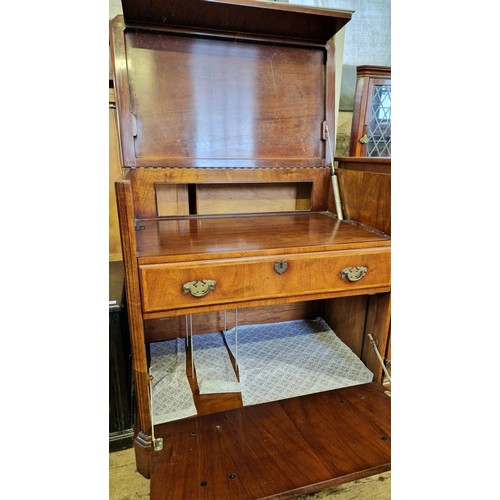 259 - Reproduction walnut cabinet with dummy drawers, central drawers and lower fall front cupboard