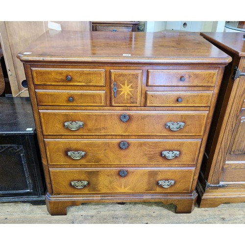 259 - Reproduction walnut cabinet with dummy drawers, central drawers and lower fall front cupboard