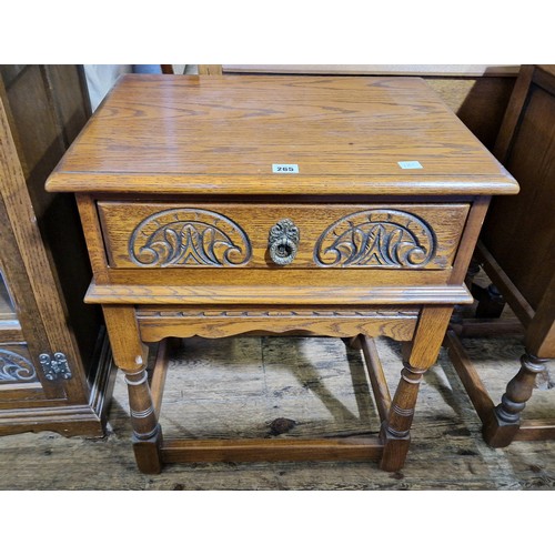 265 - Old Charm oak rectangular side table with single carved front drawer on turned legs