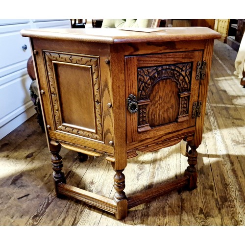 268 - Old Charm oak side cabinet with relief panels on turned legs