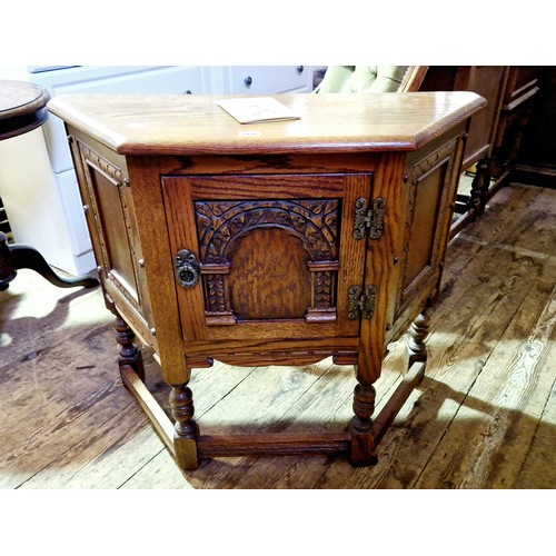 268 - Old Charm oak side cabinet with relief panels on turned legs