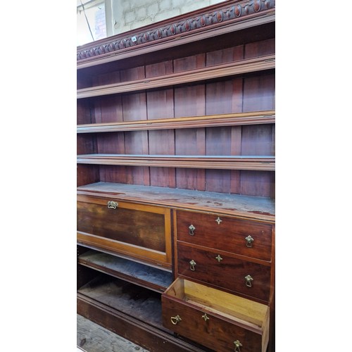 281 - Edwardian mahogany secretaire with upper shelves, drawers and fall front with fitted interior