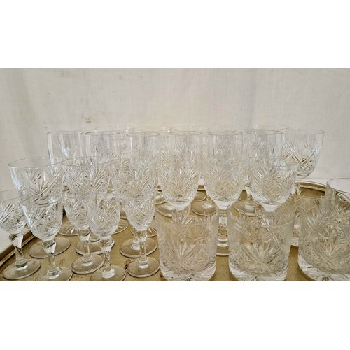 64 - Set of cut crystal tumblers and stemmed glasses