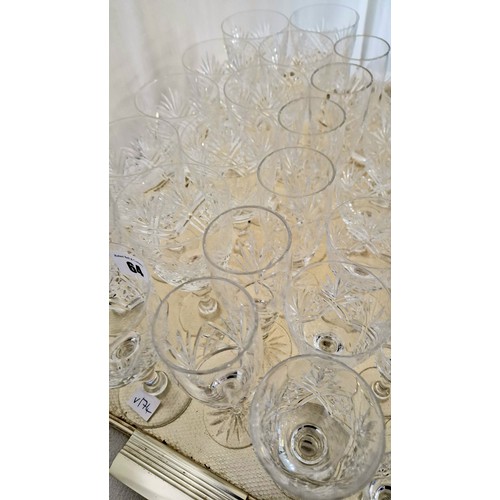 64 - Set of cut crystal tumblers and stemmed glasses