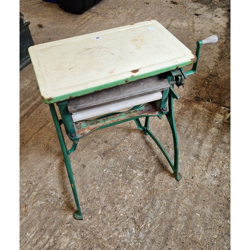 20 - Vintage mangle on cast base with enamel top