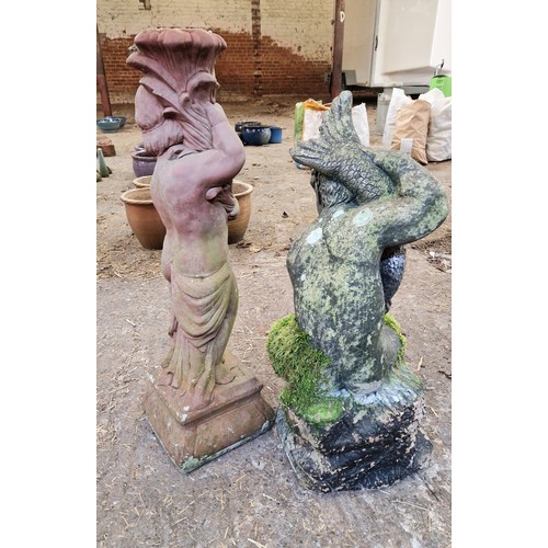 72 - Two simulated stone cherub garden figures