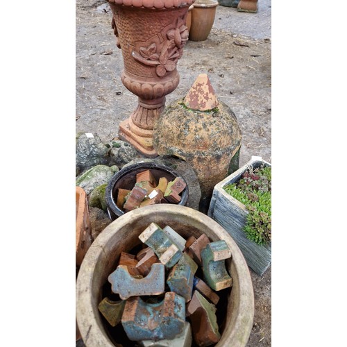 56 - Qty of simulated stone garden figures and planters, pot feet etc