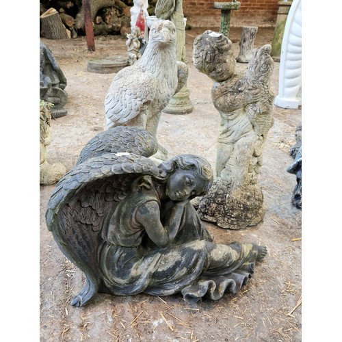 60 - Three various simulated stone garden figures