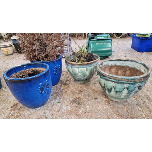 66 - Two pairs of coloured glazed terracotta planters