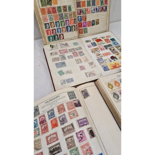 114 - Four albums of world stamps