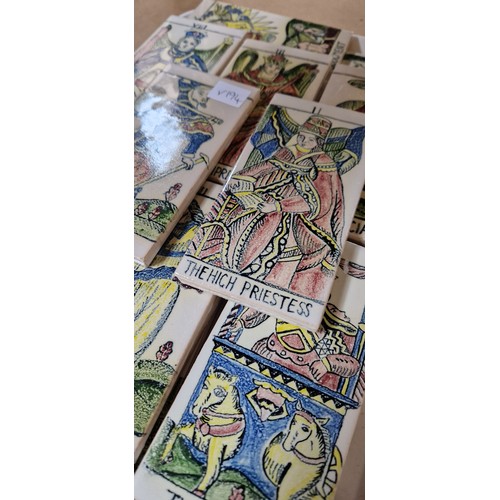 186 - Collection of 22 ceramic tiles depicting the tarot major arcana