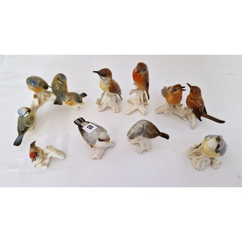 153 - Collection of eight Karl Ens porcelain song bird figurines including two groups - each on average 14... 