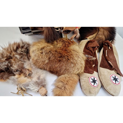 218 - Various leather and fur, moccasins, bags etc