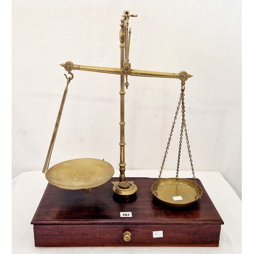 267 - Brass hanging scales on mahogany base with fitted drawer