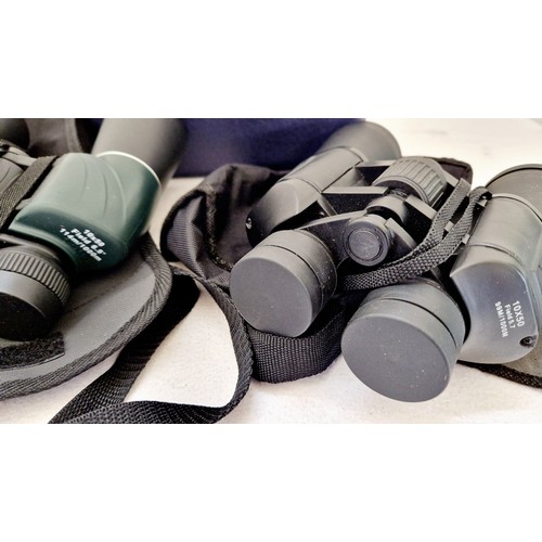 273 - Two pairs of binoculars 10x50, missing 1 lens cap and Clubman 10x50 with lens caps and a vintage Bro... 