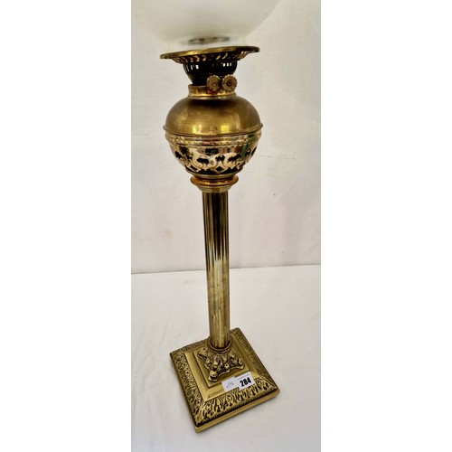 284 - Brass column oil lamp on square base approx. 82cm tall incl. glass chimney