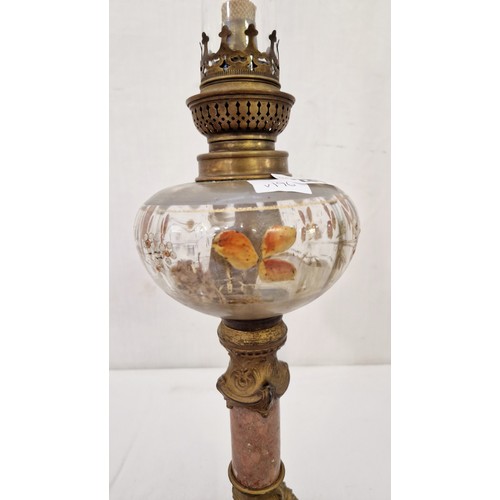 285 - Oil lamp on pierced brass base with floral glass reservoir approx. 60cm tall including chimney