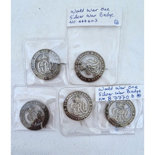 291 - Five WWI silver war badges, No's B177725; 444603; B77705; 516334 and 130996