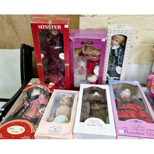 362 - Collection of seven various boxed porcelain headed dolls