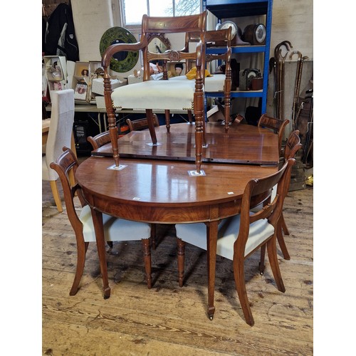 407 - A late Victorian mahogany dining suite, comprising a D-ended extending table on tapering square legs... 