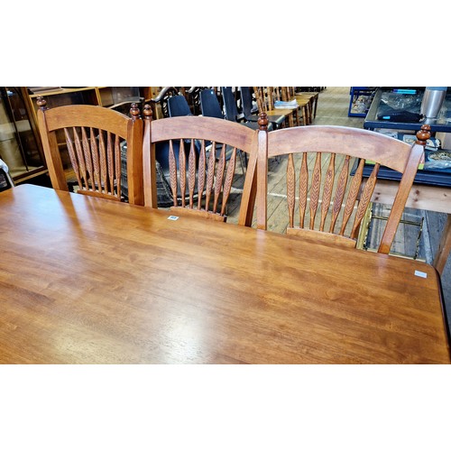 410 - Modern hardwood dining suite comprising rectangular table and six wheat ear splat back dining chairs